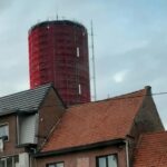 Stofhinder rond renovatie watertoren Erpe-Mere zorgt voor bezorgdheid bij omwonenden.