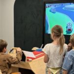 Van treinreis tot Game Boy: leerlingen van De Klaproos ontdekken speelgoed van vroeger en nu.